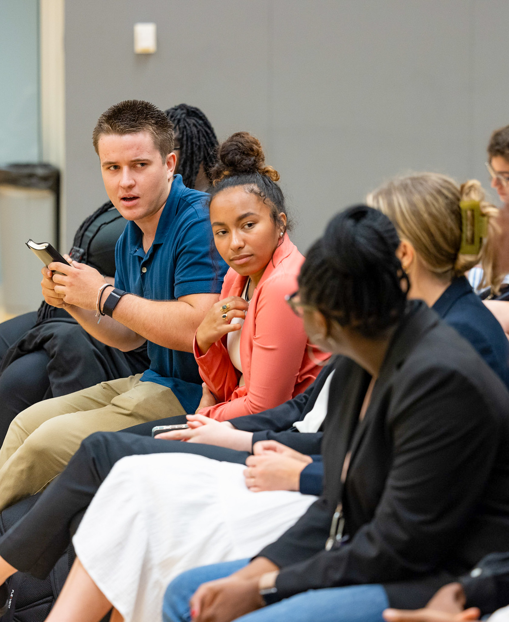 Small group discussion with diverse students in circle