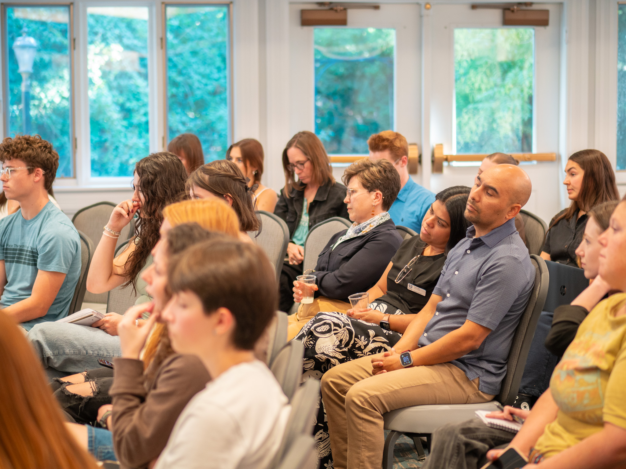 Diverse group of students engaged in classroom discussion