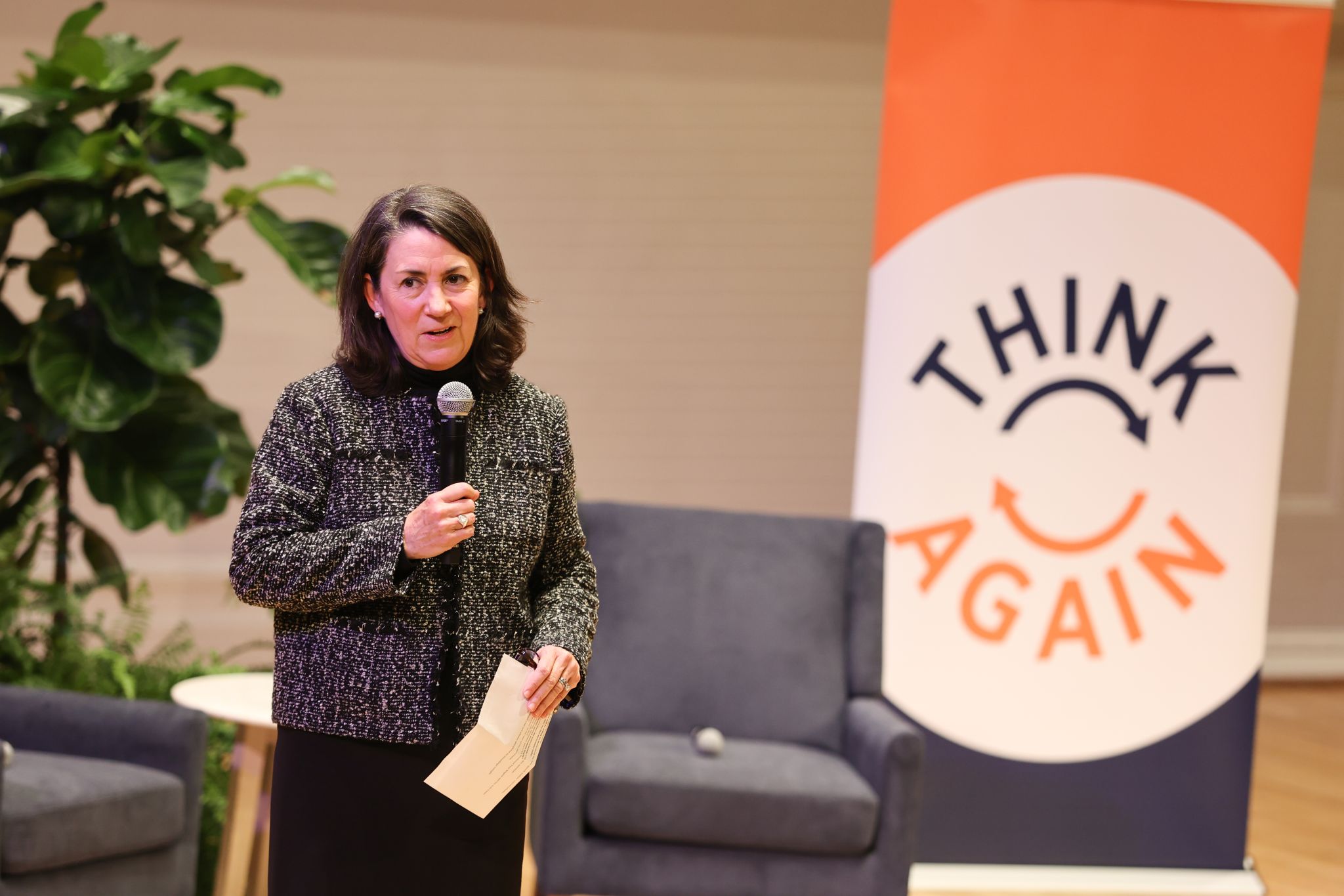 Speaker presenting at Think Again event