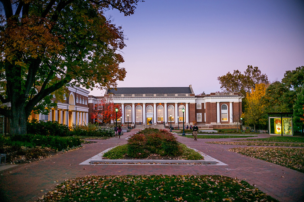 Beautiful classical university building with columns during golden hour